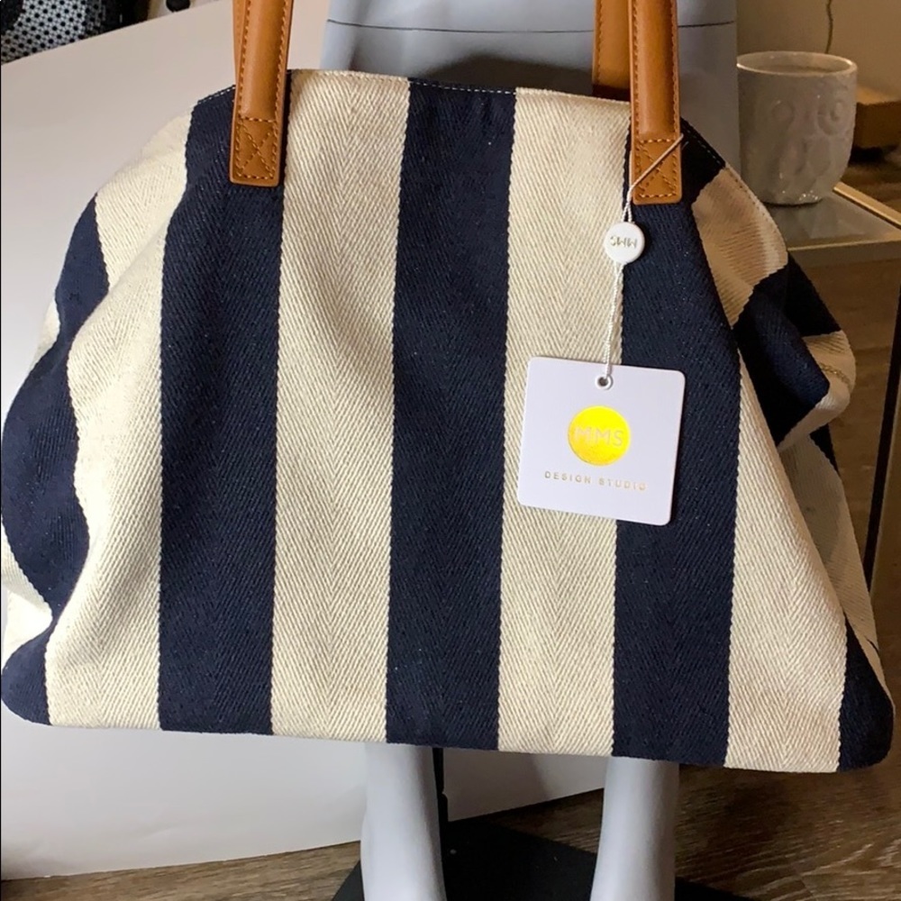 Women’s three pocket hobo casual handbag